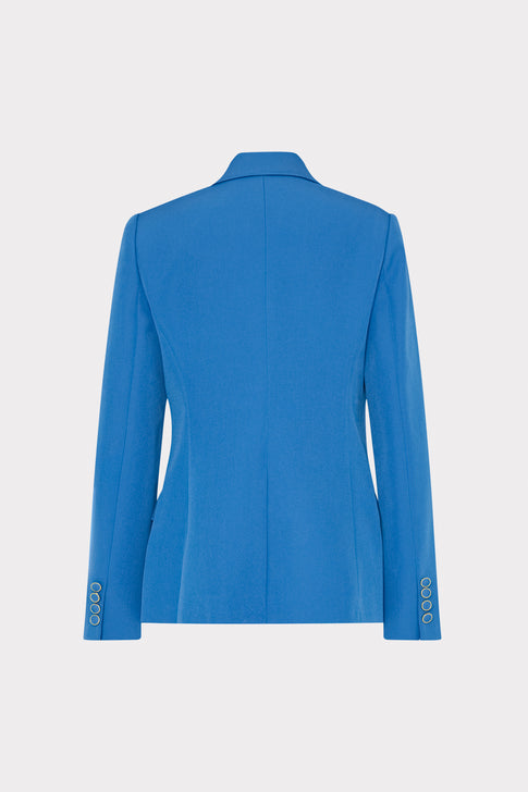 Blue blazer on a light gray background