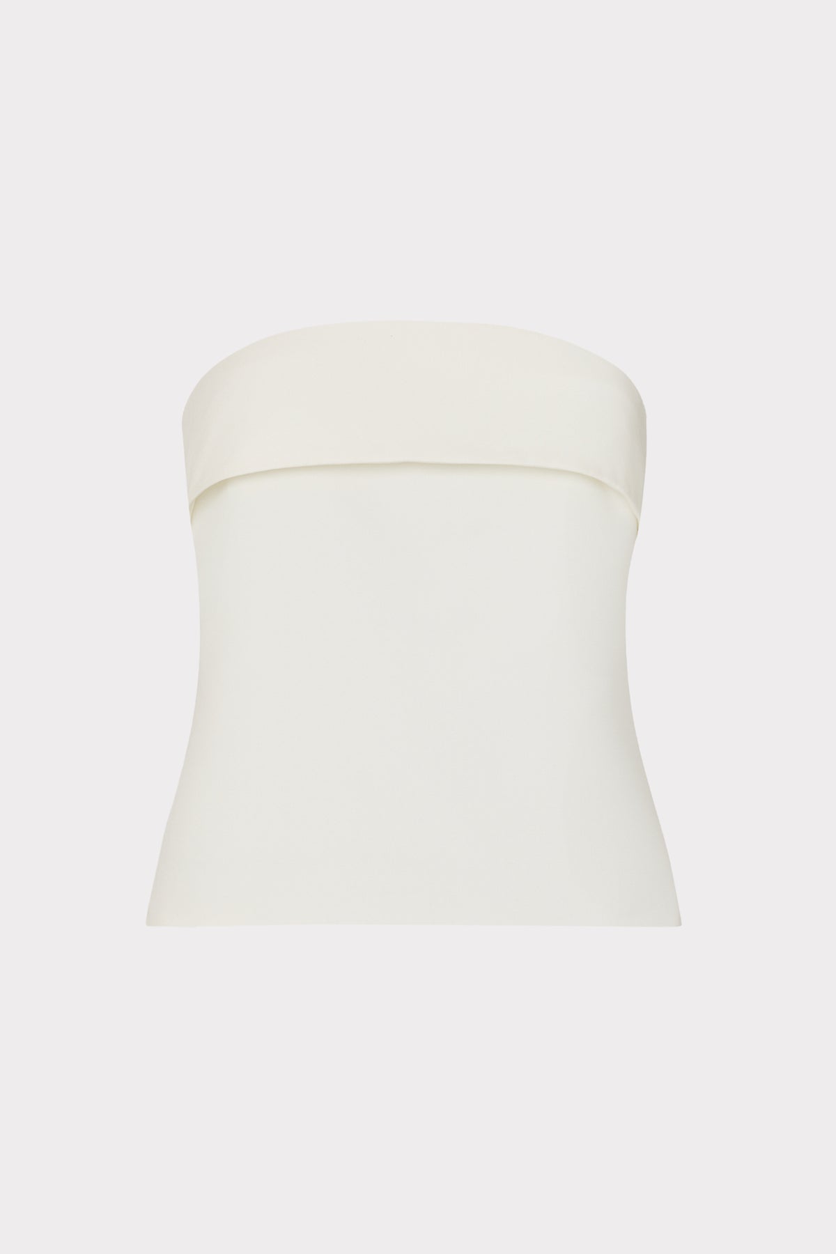 White strapless top on a light beige background