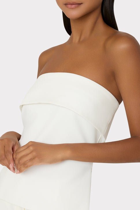 Close up of model wearing Tuala strapless top showing fold detail | MILLY