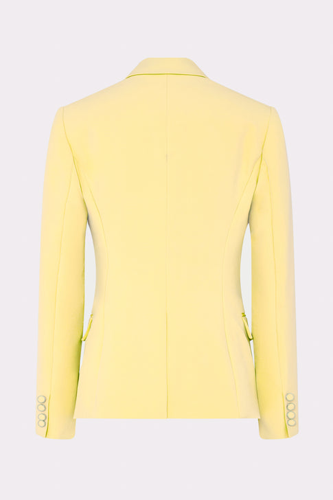 Yellow blazer on a light gray background
