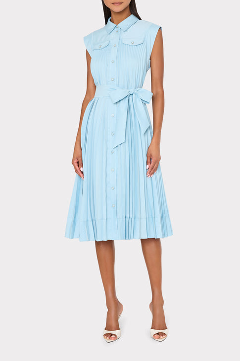 Light blue dress with a belt worn by a model on a white background