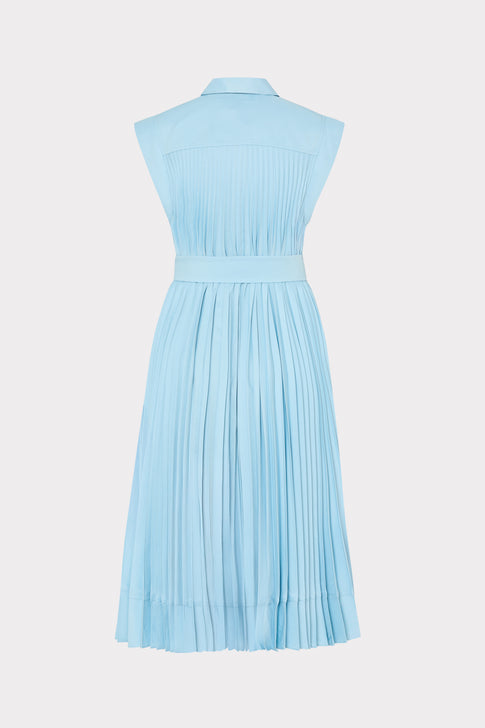 Light blue pleated dress on a white background