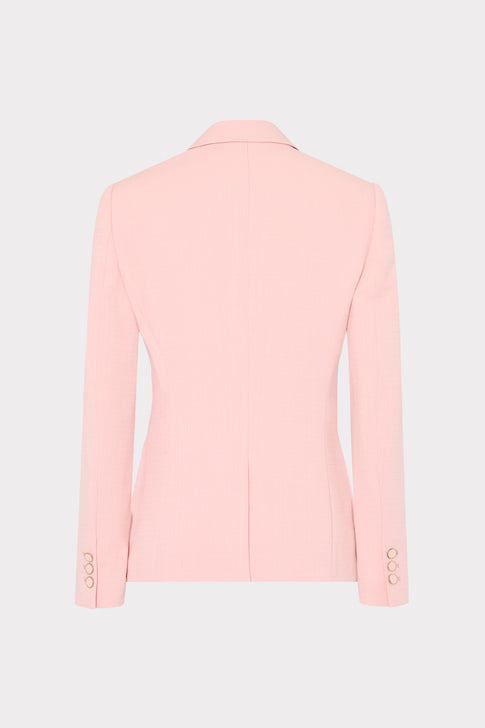 Pink blazer on a light gray background