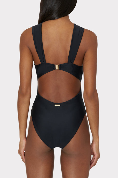 Black Betsy one piece featuring strappy back design with gold accents - Rear View Detail | MILLY