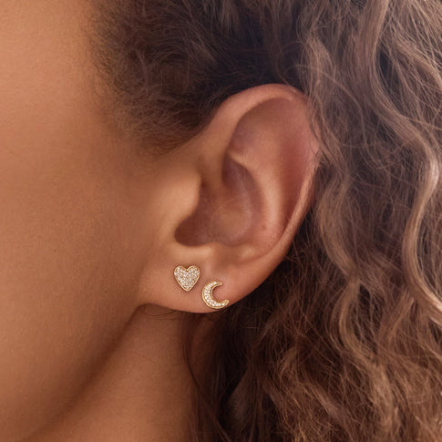Gold Pavé Heart Studs On Model - Side Profile | MILLY