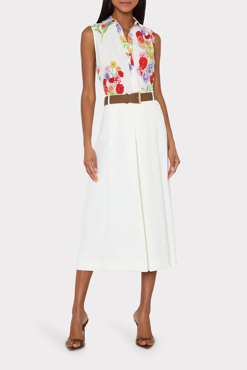 Josephine Printed Blouse styled with white pleated midi skirt, elegant floral designer top - Full Length | MILLY