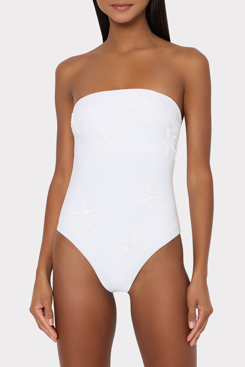 White strapless swimsuit with starfish embroidery worn by model - Front View | MILLY
