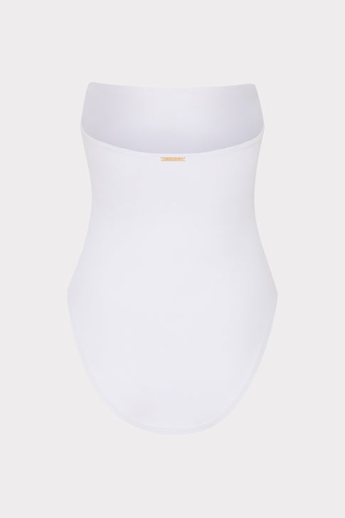 White strapless one piece swimsuit with elegant silhouette - Flat Lay | MILLY