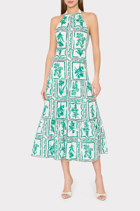 Model wearing green and white printed Hayden tiered midi dress - Front View | MILLY