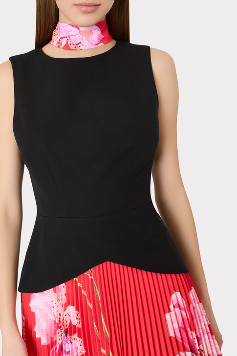 Black Sleeveless Top with Red Pleated Skirt Featuring Floral Patterns - Detail View | MILLY