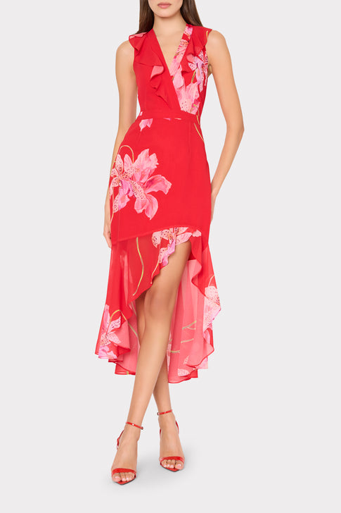 Red floral dress worn by a model on a white background