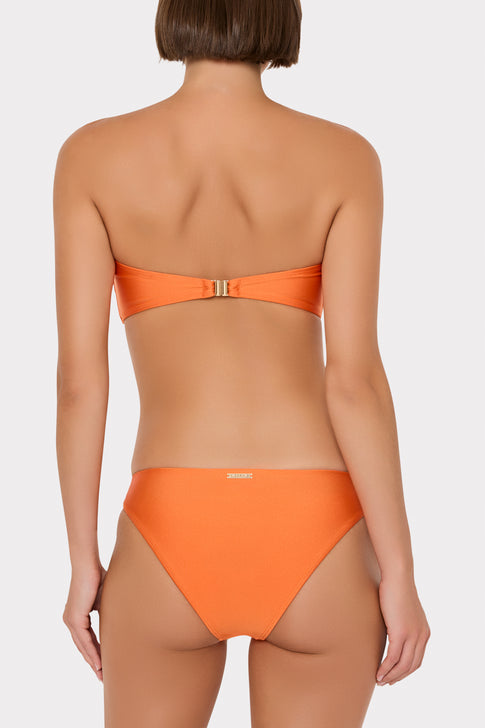 Orange bikini set on a white background