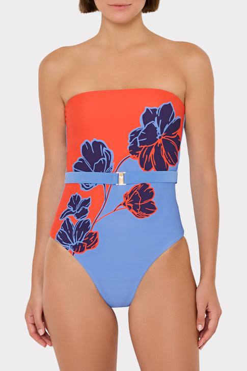 Model wearing orange & blue strapless floral one-piece swimsuit - Front View | MILLY
