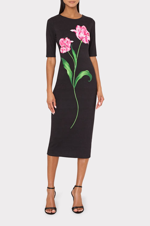 Model wearing Black Jersey Poppy Placement Midi Dress with 3-Quarter Sleeves - Front View | MILLY