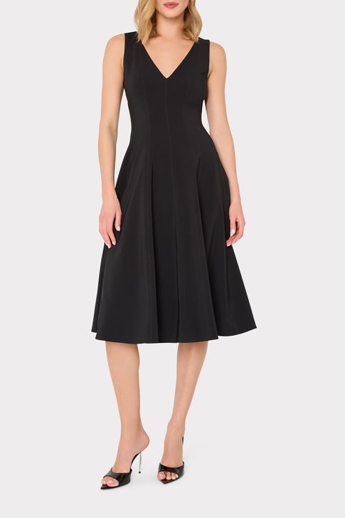 Black sleeveless Linda midi dress worn by model - Designer Silhouette | MILLY