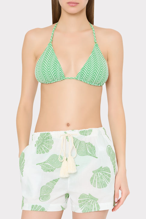 Model wearing Designer Green Bikini with Shell Print Cover-Up Shorts - Front Close-Up | MILLY