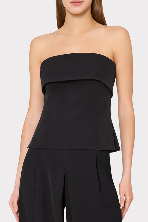 Black designer strapless top with architectural details - Close-up Detail | MILLY