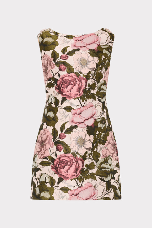 mini multi-colored floral dress on plain background.