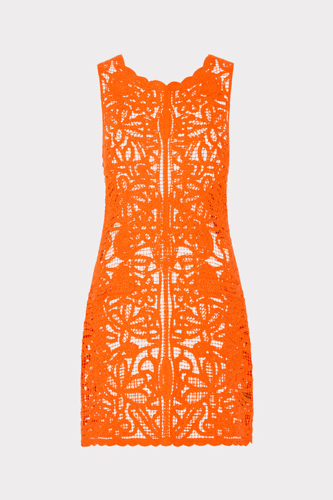 Orange lace dress on a light gray background