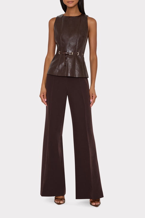 Dark Brown Gwen Faux Leather Peplum Top On Model with Wide-Leg Trousers - Front View | MILLY