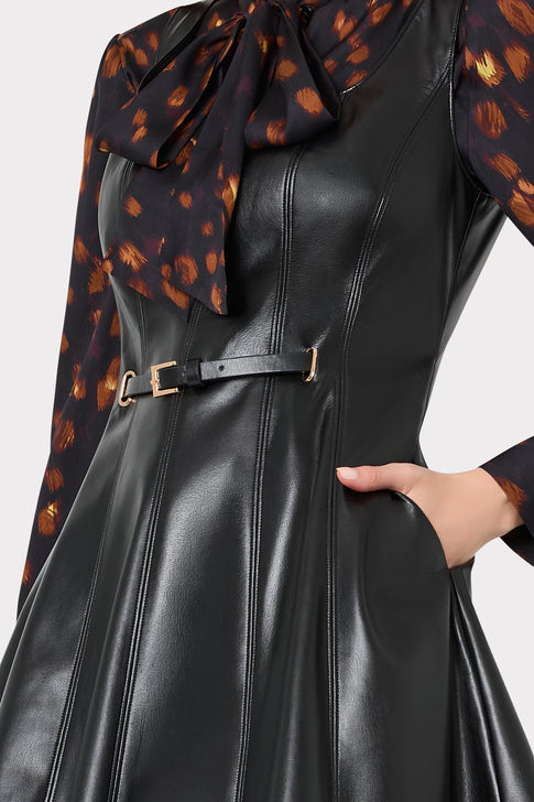 Black Vegan Leather Mini Dress - Close-Up Gold Buckle Belt and Seam Detail | MILLY