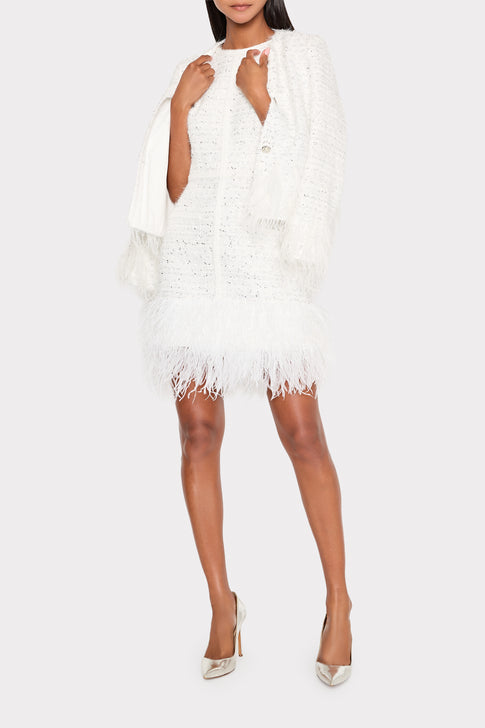 White metallic tweed jacket styled with feather dress - Coordinated Look | MILLY