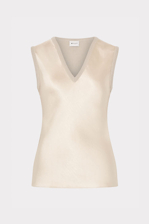 Beige sleeveless top on a light gray background