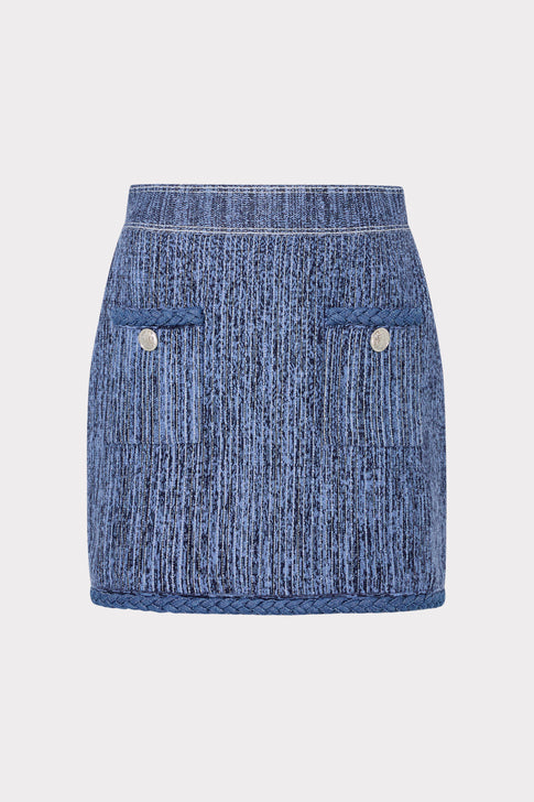 Blue denim skirt on a light gray background