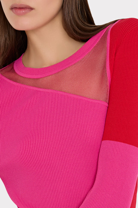 Close-up of pink geometric knit top with elegant mesh shoulder panels - Detail View | MILLY