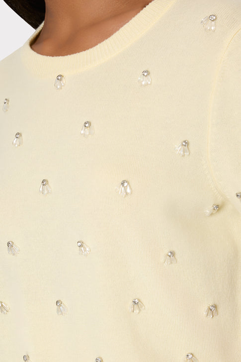 Light yellow knit sweater with elegant rhinestone embellishment detail - Close-up | MILLY