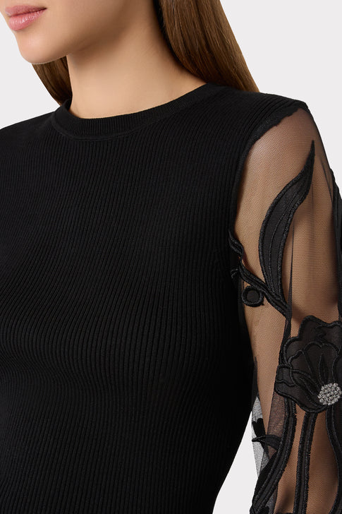 Black Ribbed Knit Pullover - Elegant Sheer Floral Appliqué Sleeve Close-Up | MILLY