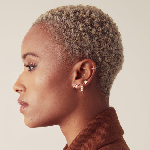 Gold Heart Stud Earrings - On Model Side Profile | MILLY